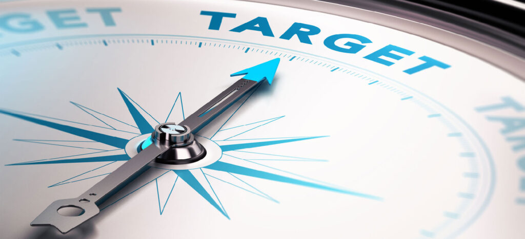 image of a compass pointing text saying target reflecting targeted media