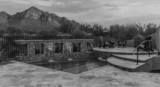 pool with water features from pools by design displayed on a amped